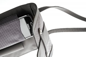 The Nokia E72 Amethyst in a limited edition Ginger & Smart for Nokia leather pouch