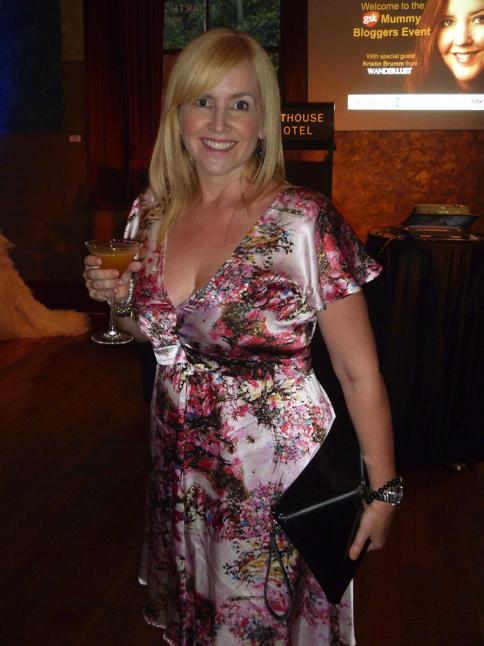 Sacha Drake Calliope dress; Mogil clutch; Coolbabycool bracelet and Chelsea de Luca earrings