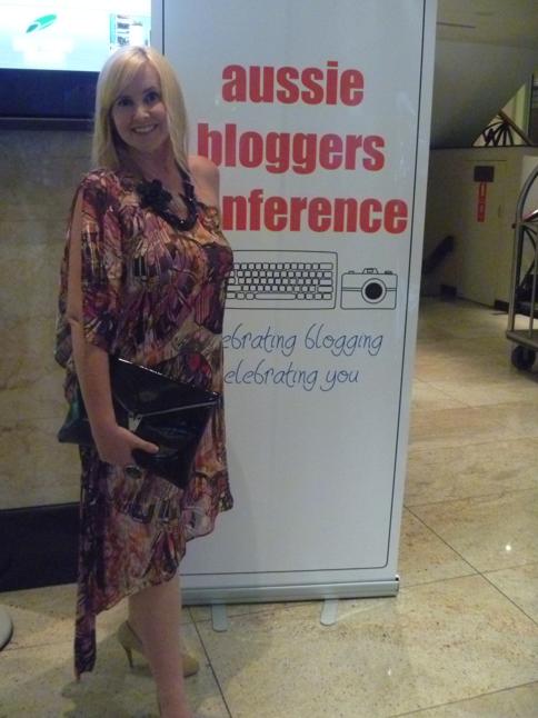 Sacha Drake Tyler dress; Mogil clutch; Salita Matthews necklace; The Little Shoe Box shoes