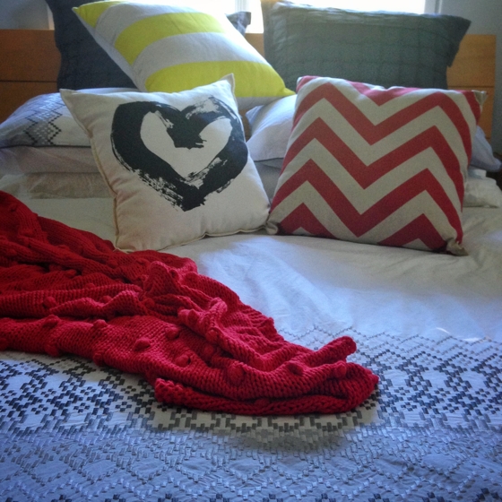 Bed | Freedom Furniture quilt cover, chevron red and neon yellow cushions | Pony Rider heart cushion | red cotton throw